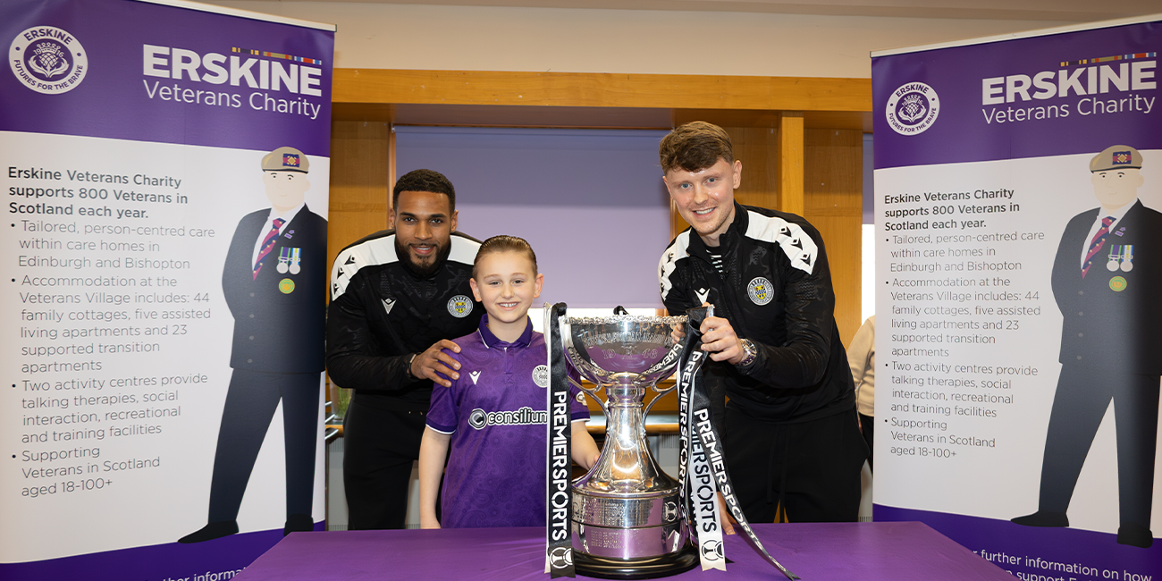 Jonah Ayunga and Mark O'Hara with a young St Mirren supporter at Erskine Veterans Charity