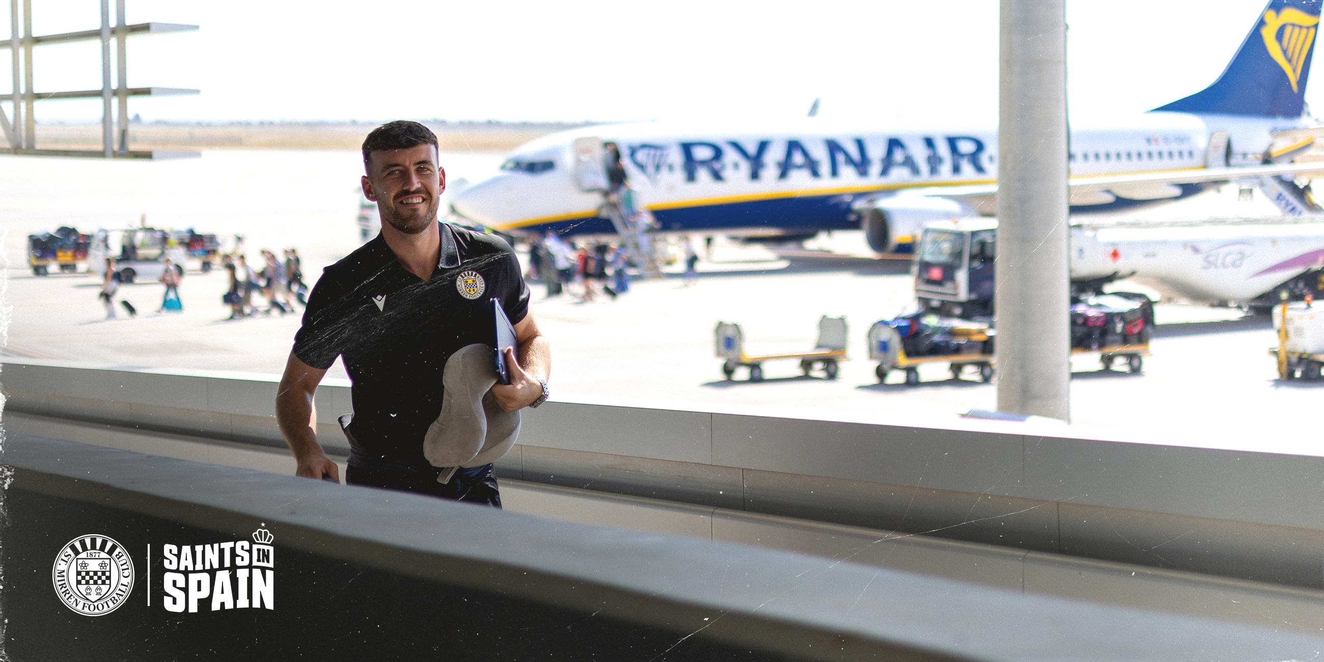 Oisin Smyth smiles on arrival in Spain