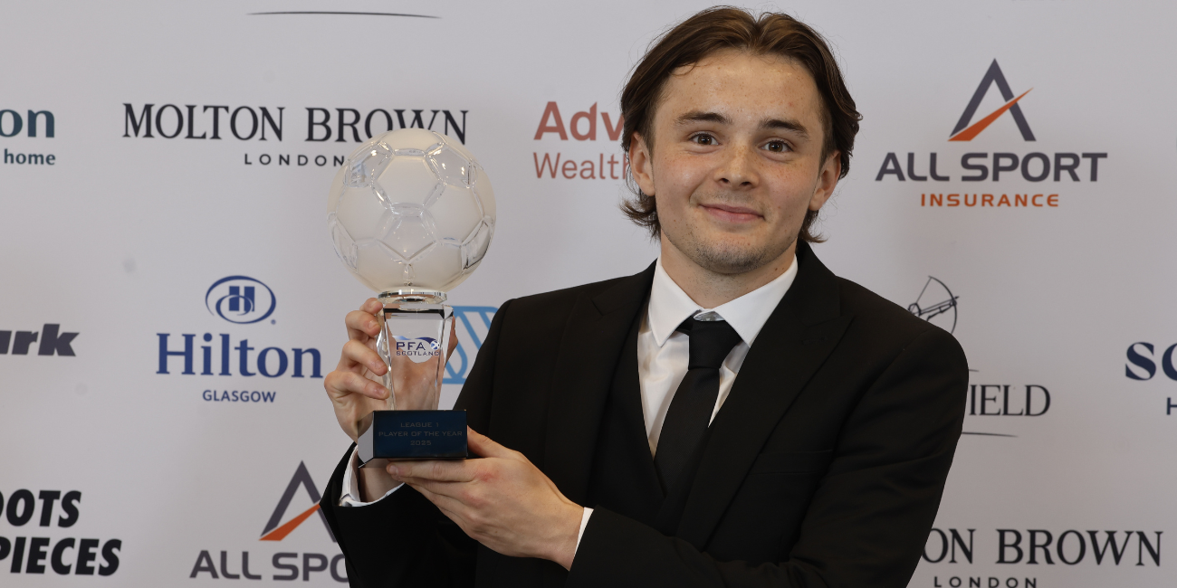 Fraser Taylor is presented with the PFA Scotland League 1 Player of the Year award