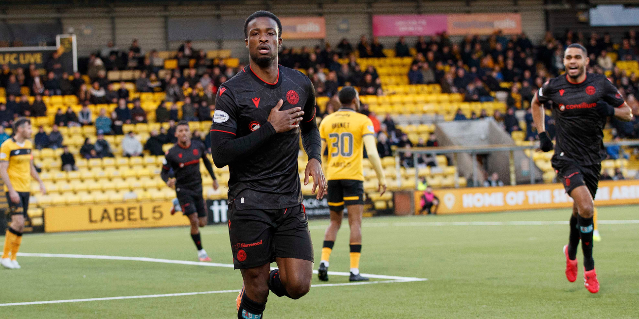 Roland Idowu celebrates opening goal