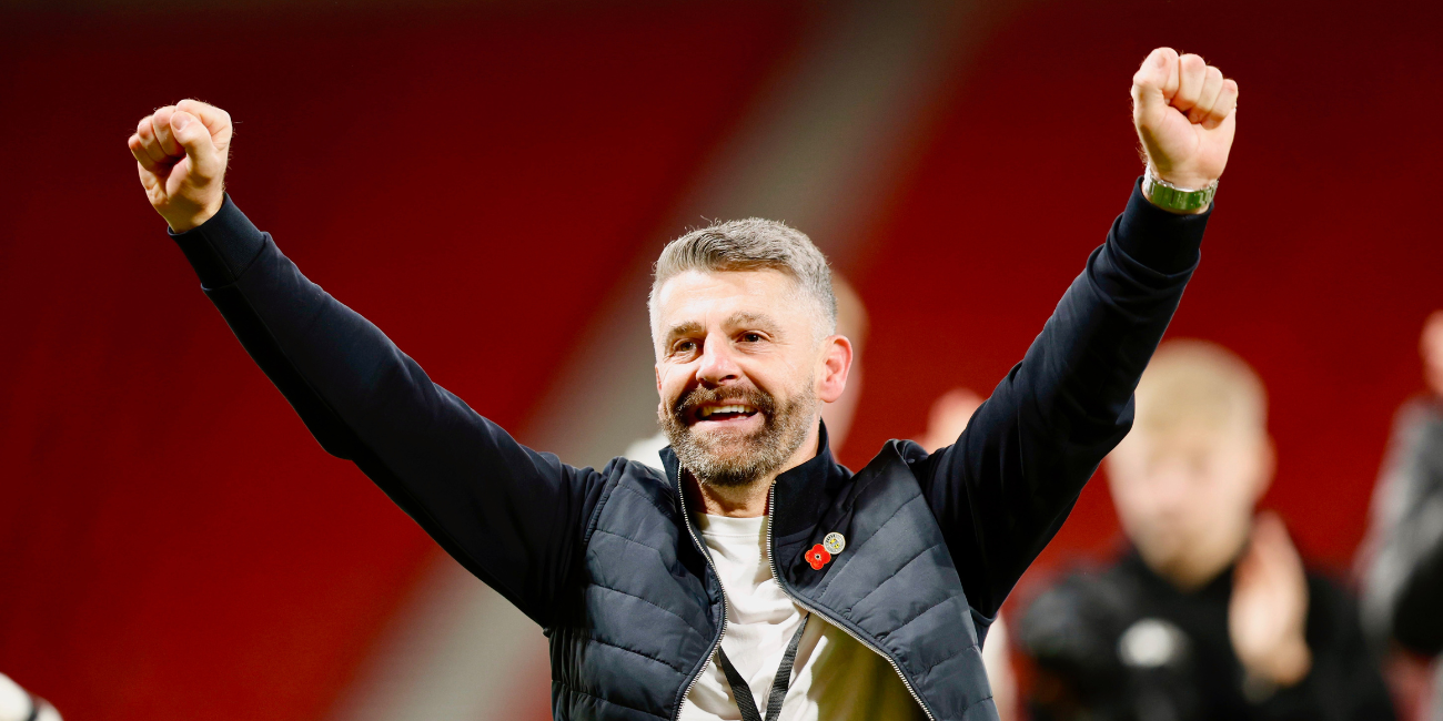 Manager Stephen Robinson celebrates post-match